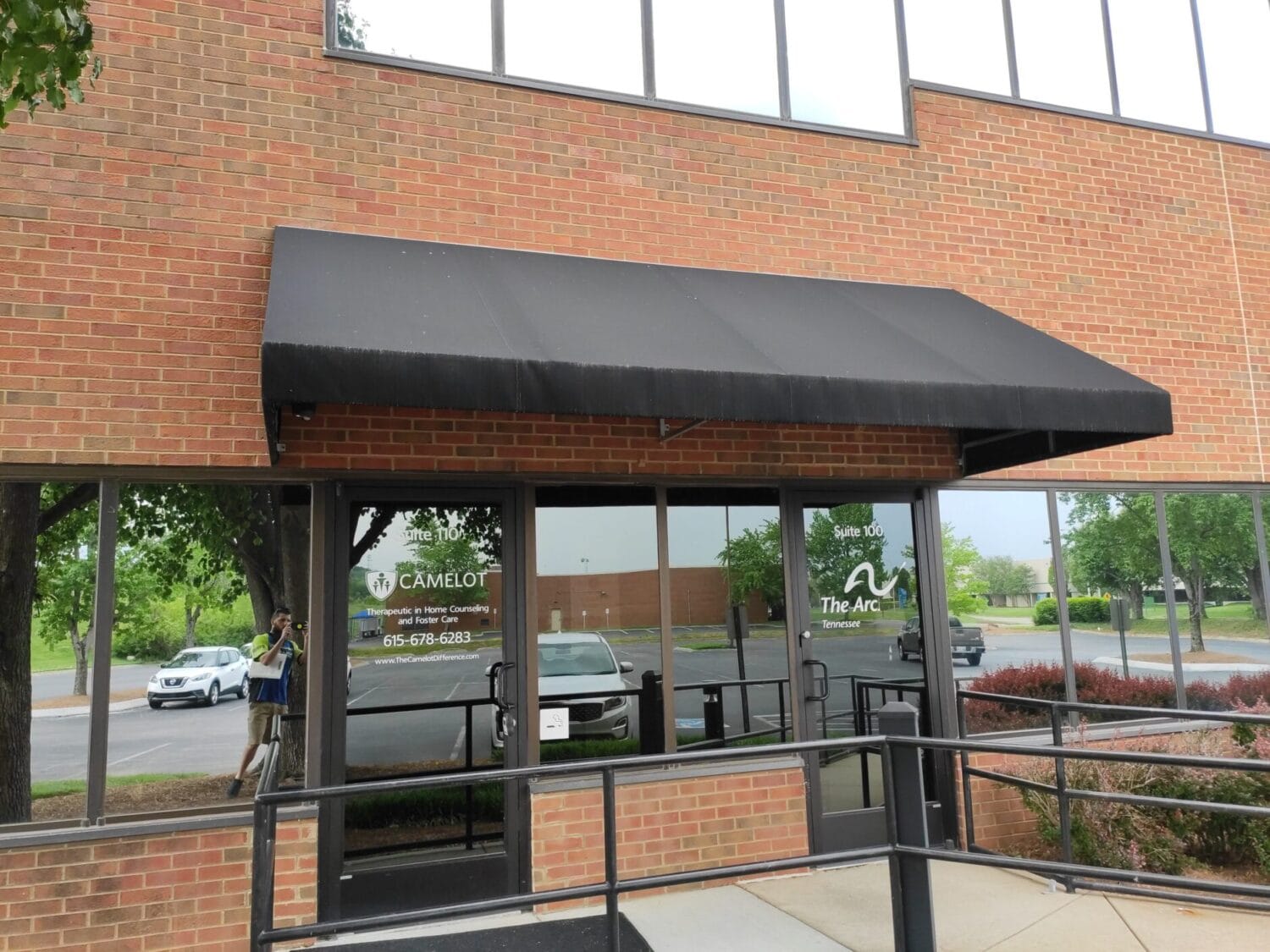 A dirty, stained commercial awning.